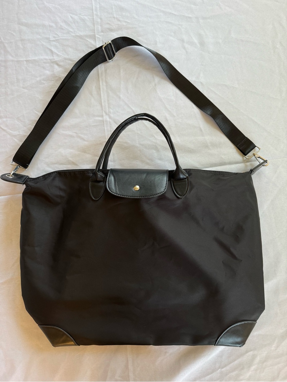 Amazon Black Carryall Bag with Adjustable Strap, missing bag tag